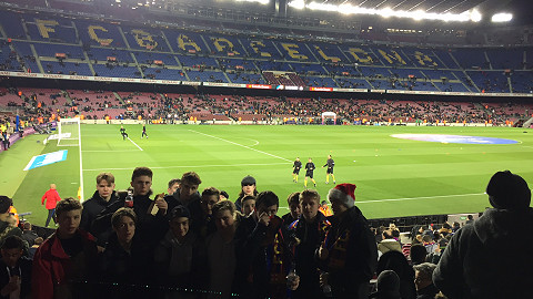 football tour group from London watch a match at Camp Nou