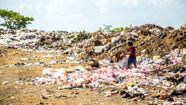 textile waste on a dump in Global South
