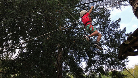 Rope climbing in Milan for young football tour sportsman
