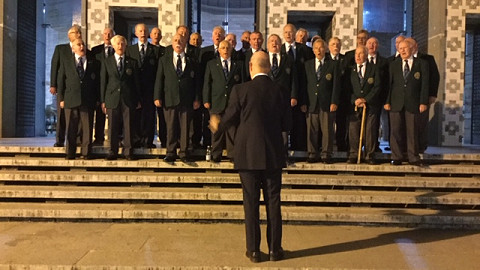 male voice choir tour to Tuscany perform in a Basilica