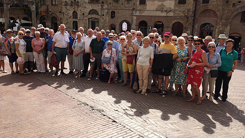 A Welsh male voice choir tour group enjoy some downtime in Tuscany